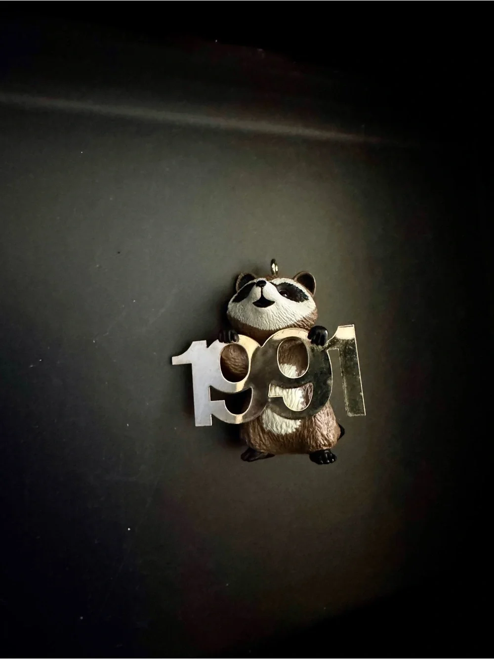 Racoon ornament with the Label Red and Green Hallmark Collector Ornament Box